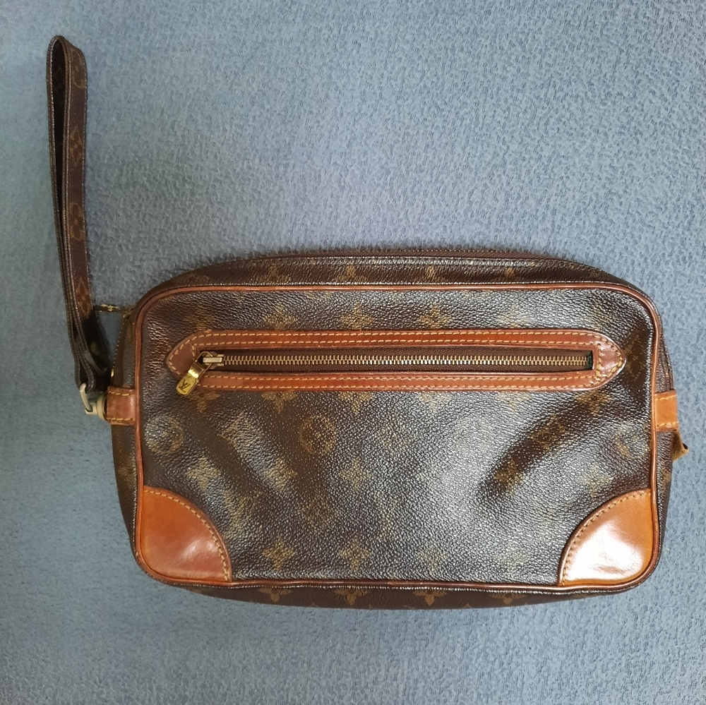 Authentic LV Marly Dragonne clucth Monogram Canvas.